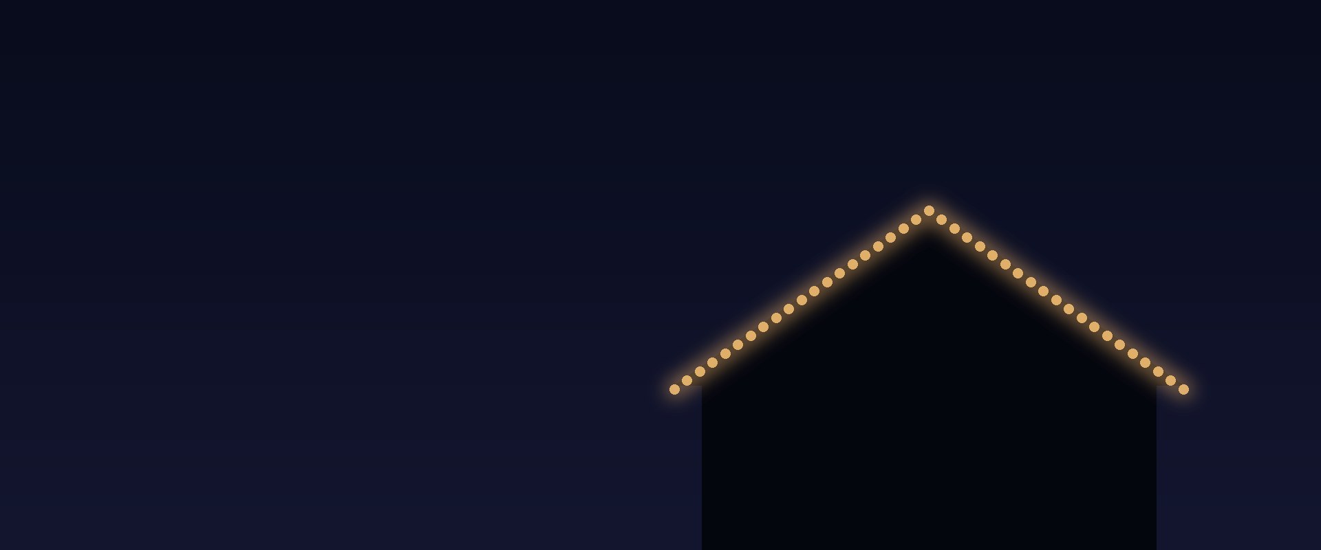 Permanent eave lights on a house at night